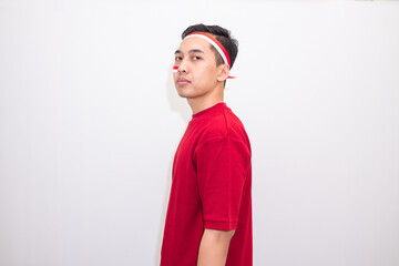 A Young Man Standing Casually With Confidence And Style, Representing Nationalistic Values And Indonesian Identity Through Modern Simplicity.