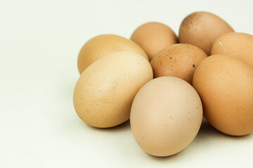 Close up of chicken egg isolated on white background with negative space photography composition.
