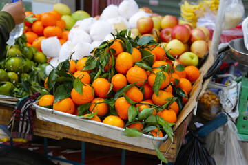 Fresh tangerines displayed at a local market in Vietnam