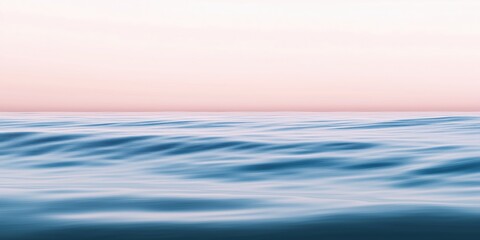 Obraz premium Calm ocean with a pink sky in the background