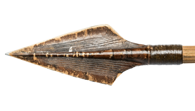 ancient tribal spear or traditional harpoon weapon with carved wooden shaft and sharp primitive arrowhead on isolated background for history and hunting concept
