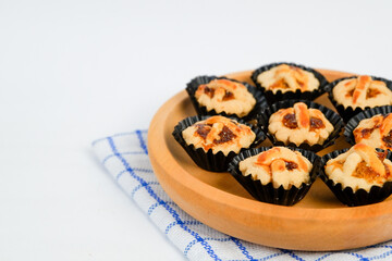 Nastar cookies on a wooden plate