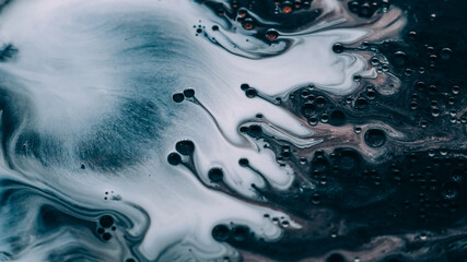 Bubble fluid. Oil liquid texture. Defocused dark black white paint in water round shiny drop spreading on abstract art background.