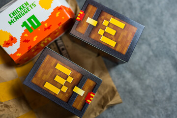 Fototapeta premium Bangkok, Thailand - April 8, 2025 : Blind box toy from McDonald's collaboration with Minecraft movie limited edition.