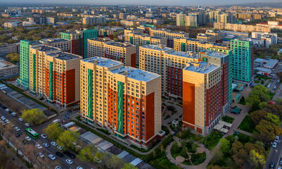 Naklejka premium A view from a quadcopter of a modern residential complex in the Kazakh city of Almaty on a spring day