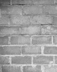 Close-up view of a Hebel brick wall surface, showcasing its porous texture and lightweight concrete structure