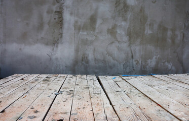 Abstract background of cement wall and planks.