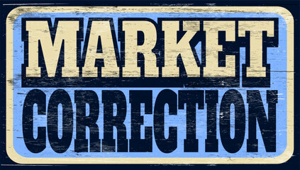 Fototapeta premium Aged and worn market correction sign on wood