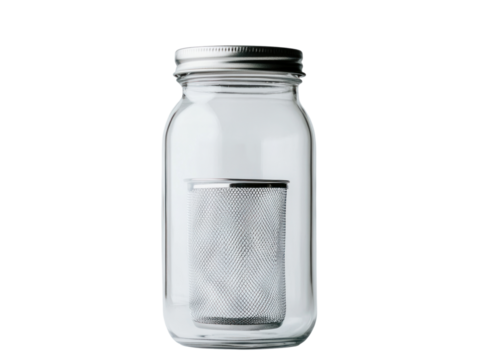 Brewing fresh tea with a stainless steel infuser in a jar cutout background artistic photography