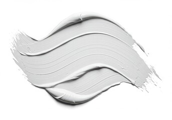 A close up of a thick white paint smear with visible texture on a plain white background surface