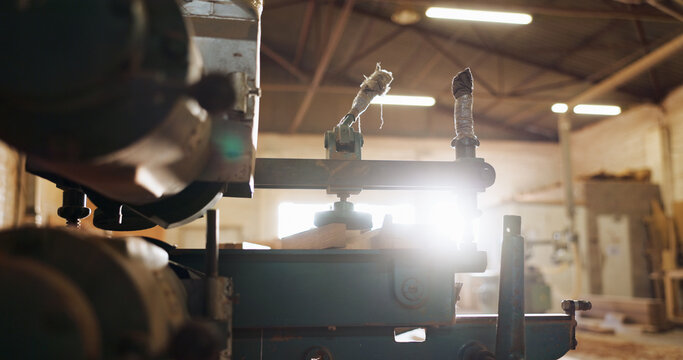 Woodwork, machine and carpentry in empty workshop of wood shaping, custom design and furniture labor. Lathe equipment, tools and manual safety, craft production and remodeling maintenance in industry