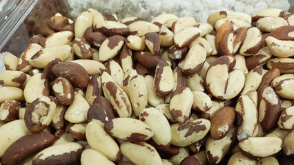 Peeled Brazil nut without shell close-up. The content of selenium in nuts. Vegetable protein and long acids.
