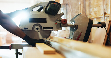 Workshop, hands and machine with wood for carpenter, diy manufacturing or production business. Closeup, person and contractor with saw tools for furniture service, maintenance or cut plank in factory