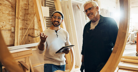 Carpenter team, man and tablet in workshop for woodwork project inspection, checking framework or monitor process. Manufacturing, people and happy with structure evaluation and furniture production