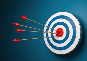 Arrows hitting the bullseye of a target with blue and white rings on a blue background surface