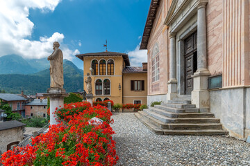 Sculptures at the entrance to the church in Entracque, Italy.