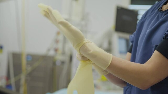 Footage showing hospital staff discarding clean or unused medical clothing and gloves, highlighting unnecessary waste in healthcare.