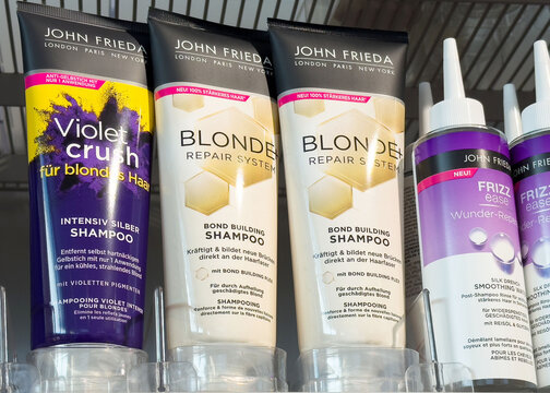 John frieda hair care products on display: violet crush and blonde repair shampoo