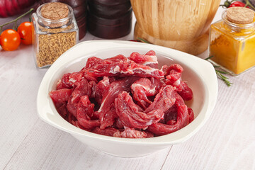 Raw beef meat - sliced strips