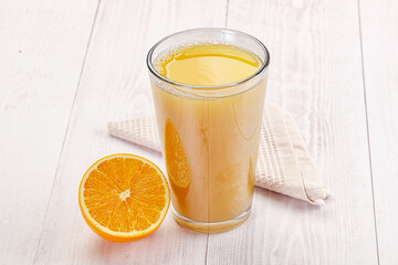 Sweet fresh orange juice in the glass