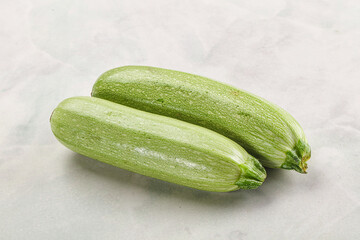 Raw green ripe zucchini vegetable