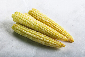 Raw sweet baby corn heap