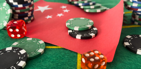 Chips from casino. Flag of China. Gambling business of People Republic of China. Games for money in PRC. Gambling in Chinese casinos. Background for China gambling industry. Casino in Beijing