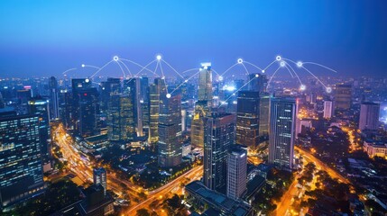 City skyline network at night. Aerial view of connected buildings. Possible use Stock photo for technology, business, or urban planning