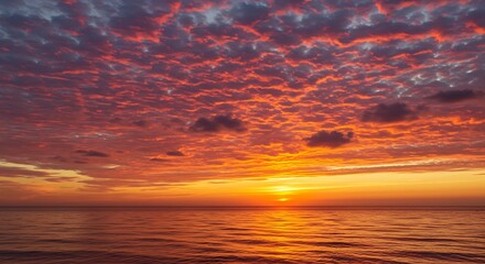 Fototapeta premium Sunset on red yellow sky back soft evening cloud over sea