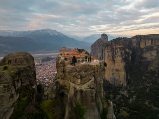 Naklejka premium Aerial View of Meteora Monastery on Cliff at Sunrise, Greece