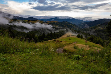 mountain landscape in the mountains in the fog after the rain