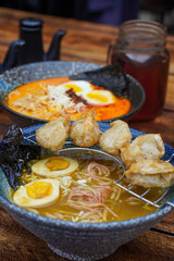 Indonesian-style ramen, captured on April 8, 2025. A savory noodle dish with rich broth, tender meat, and local spices for a flavorful fusion meal