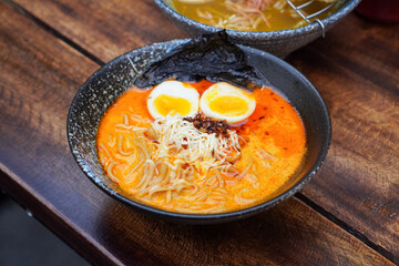 Indonesian-style ramen, captured on April 8, 2025. A savory noodle dish with rich broth, tender...