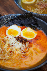 Indonesian-style ramen, captured on April 8, 2025. A savory noodle dish with rich broth, tender...