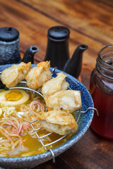 Indonesian-style ramen, captured on April 8, 2025. A savory noodle dish with rich broth, tender meat, and local spices for a flavorful fusion meal