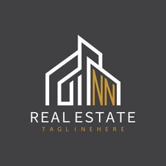 initial monogram logo for real estate with building shape creative design	

