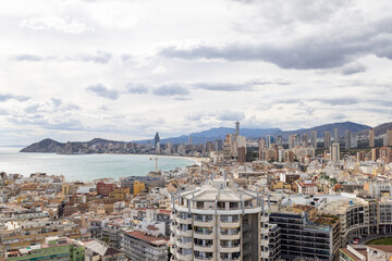 Aerial photo of the Spanish town of Benidorm in Spain showing the old town of the city with the...