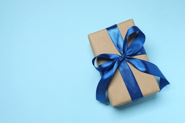 Beautiful gift box on color background