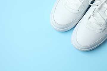 White sneakers on a blue background