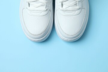 White sneakers on a blue background