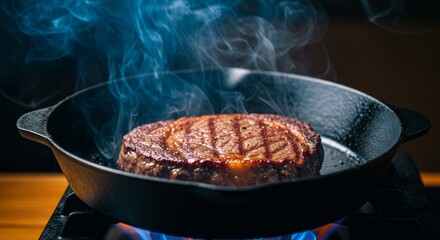 Meat is currently being cooked in a frying pan placed on a stove