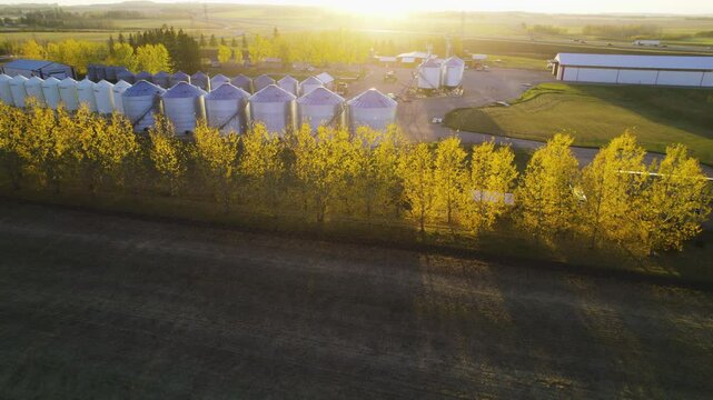 Farm With Many Grain Silos In Red Deer County, Alberta, Canada - Aerial Shot