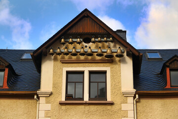Bell Carillon on Gabled Rooftop of Traditional German House