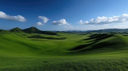 Obraz premium Lush green valley, rolling hills, clear sky