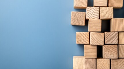 Stacked wooden cubes with checkmarks against a blue background symbolize business success concepts and designs