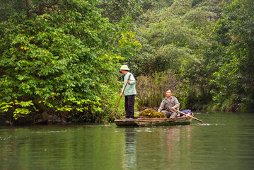 Boat on river in Ninh Binh, Vietnam. Beautiful asian landscape