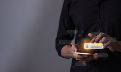 Customer Review, Young Man hand holding Smart Phone with five star to review and give 5 stars with...