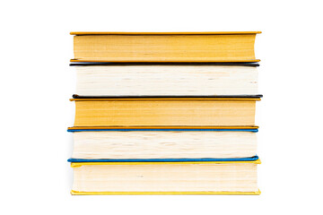 stack a large pile of printed books lies on the table, book covers and pages for study