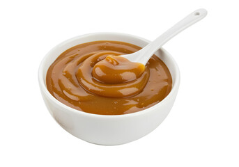 caramel sauce in white bowl isolated on transparent background