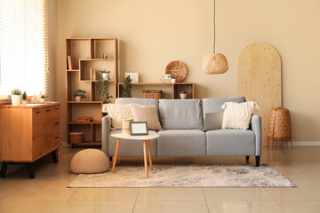 Stylish interior of living room with sofa and coffee table